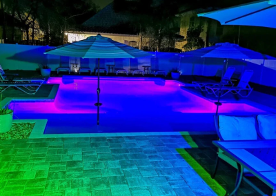 Emerald Oasis - Pool lights at night