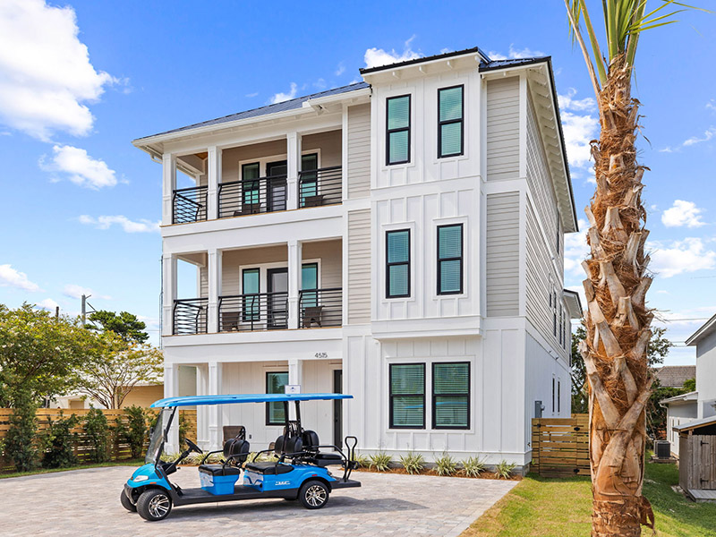 Black Pearl, front of the vacation home with golf cart