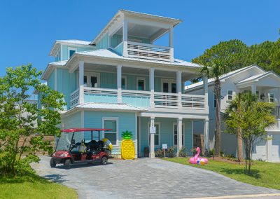 Sandy Shores, exterior of the aqua blue vacation home