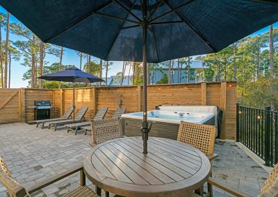 Coral Bay, outdoor table and hot tub