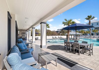 Atlantis, outdoor furniture in the shade next to the pool