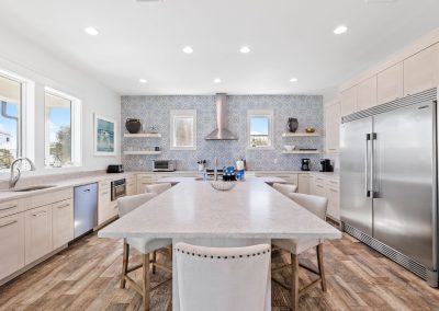 Atlantis, kitchen with table built into the island and massive refrigerator