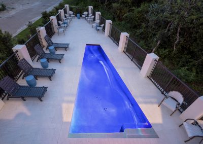 Casa D'Azure, triangle shaped pool and lounge chairs